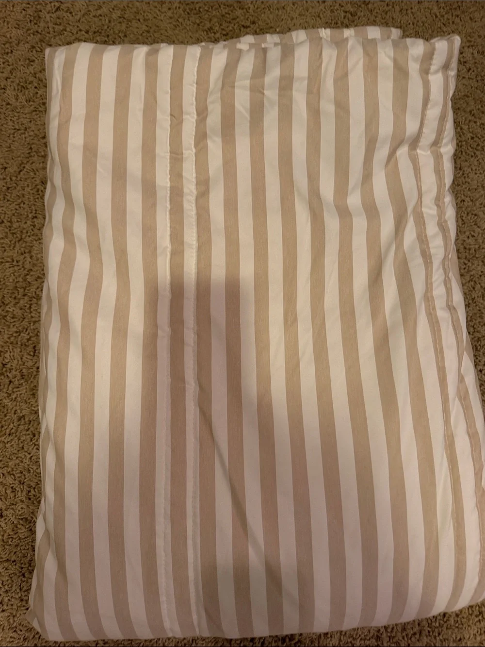 Tan and white striped comforter,  Twin